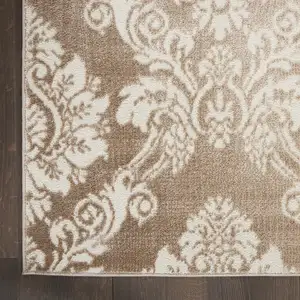 Photo of 8' Ivory and Brown Damask Distressed Non Skid Runner Rug