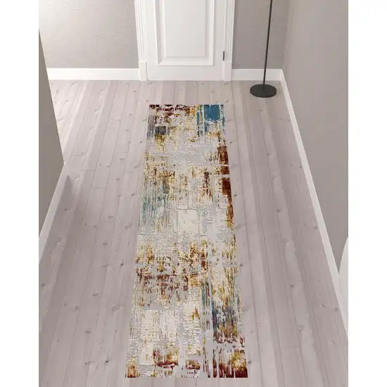 10' Ivory and Gold Abstract Runner Rug Photo 1