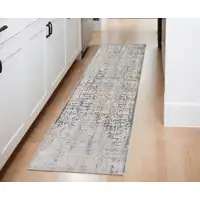 Photo of 8' Ivory and Gray Abstract Distressed Runner Rug