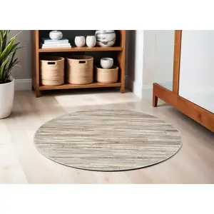 Photo of 5' Ivory and Gray Abstract Non Skid Round Rug