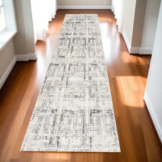 13' Ivory and Gray Geometric Distressed Runner Rug Photo 1