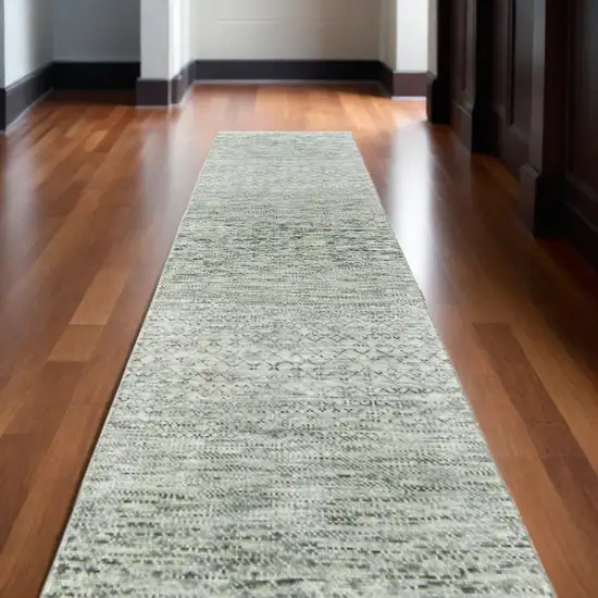 10' Ivory and Green Wool Hand Knotted Runner Rug With Fringe Photo 1