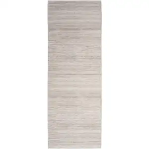 Photo of 10' Ivory and Light Brown Abstract Washable Runner Rug