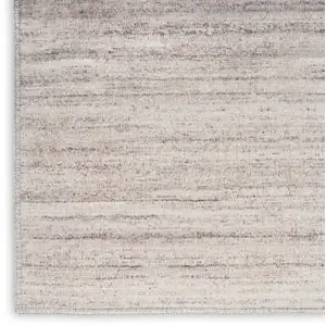 Photo of 6' Ivory and Light Brown Abstract Washable Runner Rug