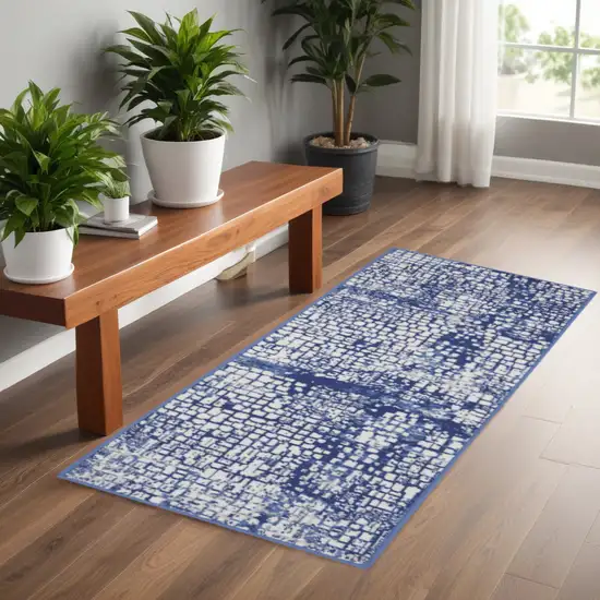 6' Ivory and Navy Blue Abstract Runner Rug Photo 1