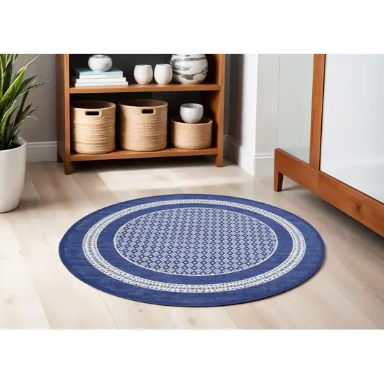 5' Ivory and Navy Blue Geometric Distressed Round Rug Photo 1