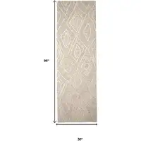 Photo of 8' Ivory and Tan Geometric Hand Tufted Runner Rug