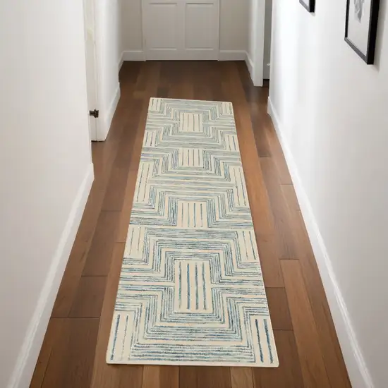 8' Ivory and Turquoise Wool Geometric Runner Rug Photo 1