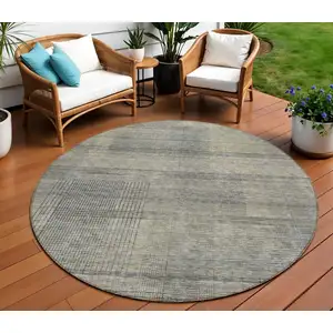 Photo of 8' Khaki Beige And Gray Round Striped Washable Indoor Outdoor Area Rug