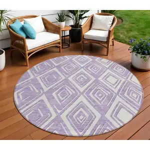 Photo of 8' Lavender And Ivory Round Geometric Washable Indoor Outdoor Area Rug