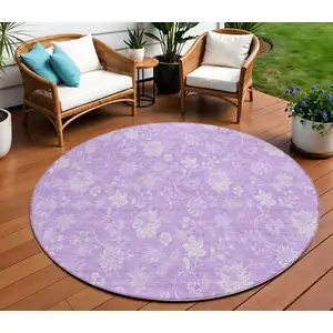 Photo of 8' Lavender And Lilac Round Floral Washable Indoor Outdoor Area Rug