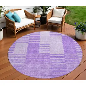 Photo of 8' Lavender And Purple Round Striped Washable Indoor Outdoor Area Rug