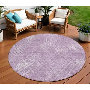 Photo of 8' Lavender Purple And Ivory Round Geometric Washable Indoor Outdoor Area Rug