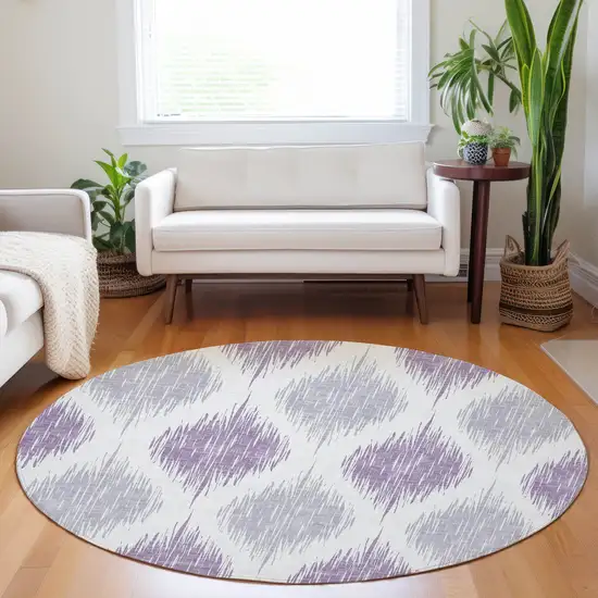 8' Lavender Purple And Ivory Round Ikat Washable Indoor Outdoor Area Rug Photo 7