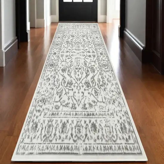 10' Gray and Light Gray Floral Power Loom Runner Rug Photo 1