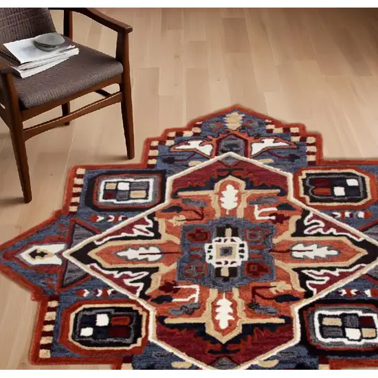 7' Maroon and Blue Medallion Area Rug Photo 1