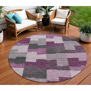 Photo of 8' Merlot Mauve And Charcoal Round Geometric Washable Indoor Outdoor Area Rug