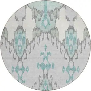 Photo of 8' Mint Green Teal Blue And Ivory Round Ikat Washable Indoor Outdoor Area Rug