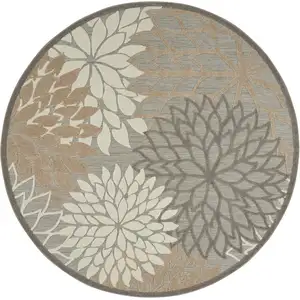 Photo of 10' Natural Round Floral Power Loom Area Rug