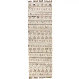 Photo of 8' Natural and Ivory Southwestern Hand Woven Distressed Runner Rug with Fringe