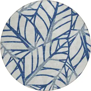 Photo of 8' Navy Blue And Beige Round Floral Washable Indoor Outdoor Area Rug