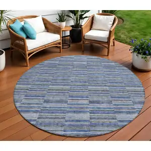 Photo of 8' Navy Blue And Denim Blue Round Striped Washable Indoor Outdoor Area Rug