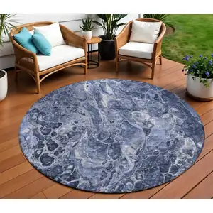 Photo of 8' Navy Blue And Gray Round Abstract Washable Indoor Outdoor Area Rug