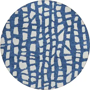 Photo of 8' Navy Blue And Ivory Round Abstract Washable Indoor Outdoor Area Rug