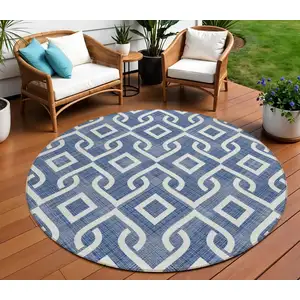 Photo of 8' Navy Blue And Ivory Round Geometric Washable Indoor Outdoor Area Rug