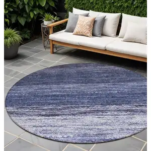 Photo of 8' Navy Blue And Ivory Round Ombre Washable Indoor Outdoor Area Rug