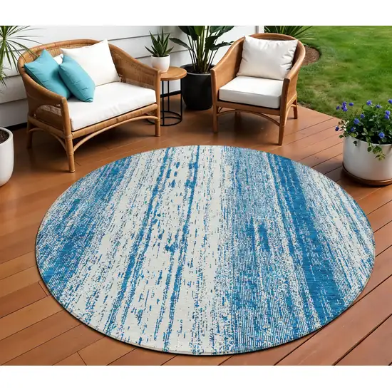 8' Navy Blue And Ivory Round Striped Washable Indoor Outdoor Area Rug Photo 1