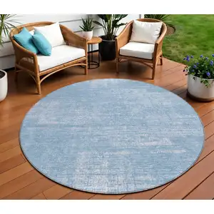 Photo of 8' Navy Blue And Sky Blue Round Abstract Washable Indoor Outdoor Area Rug