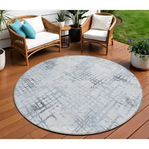 Photo of 8' Navy Blue And Sky Blue Round Geometric Washable Indoor Outdoor Area Rug