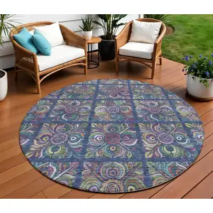 Photo of 8' Navy Blue Purple And Teal Blue Round Medallion Washable Indoor Outdoor Area Rug