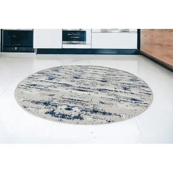 7' Navy Blue Round Abstract Washable Non Skid Area Rug With Fringe Photo 1