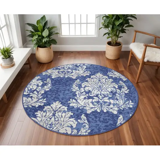 8' Navy Blue and Ivory Damask Distressed Round Rug Photo 1