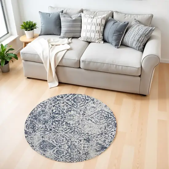 4' Navy Blue and Ivory Damask Distressed Round Rug Photo 1