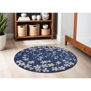 Photo of 5' Navy Blue and Ivory Floral Round Rug