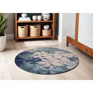 Photo of 5' Navy Blue and Ivory Floral Round Rug