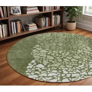 Photo of 8' Olive Green And Artichoke Green Round Abstract Washable Indoor Outdoor Area Rug