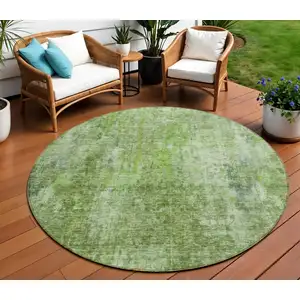 Photo of 8' Olive Green And Artichoke Green Round Abstract Washable Indoor Outdoor Area Rug