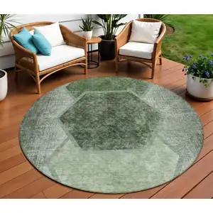 Photo of 8' Olive Green And Artichoke Green Round Geometric Washable Indoor Outdoor Area Rug