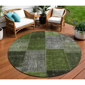 Photo of 8' Olive Green And Artichoke Green Round Patchwork Washable Indoor Outdoor Area Rug