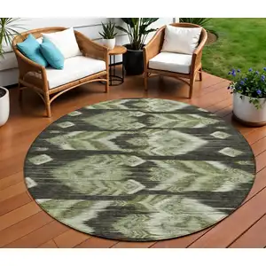 Photo of 8' Olive Green And Artichoke Green Round Southwestern Washable Indoor Outdoor Area Rug