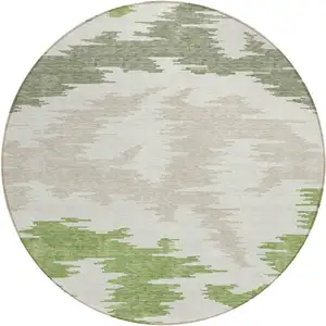 Photo of 8' Olive Green And Beige Round Abstract Washable Indoor Outdoor Area Rug