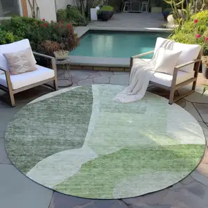 Photo of 8' Olive Green And Fern Green Round Abstract Washable Indoor Outdoor Area Rug