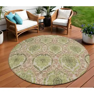 Photo of 8' Olive Green And Fern Green Round Medallion Washable Indoor Outdoor Area Rug