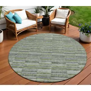 Photo of 8' Olive Green And Gray Round Striped Washable Indoor Outdoor Area Rug