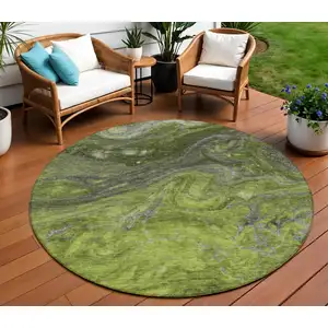 Photo of 8' Olive Green And Lime Green Round Abstract Washable Indoor Outdoor Area Rug