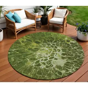 Photo of 8' Olive Green And Sage Round Abstract Washable Indoor Outdoor Area Rug